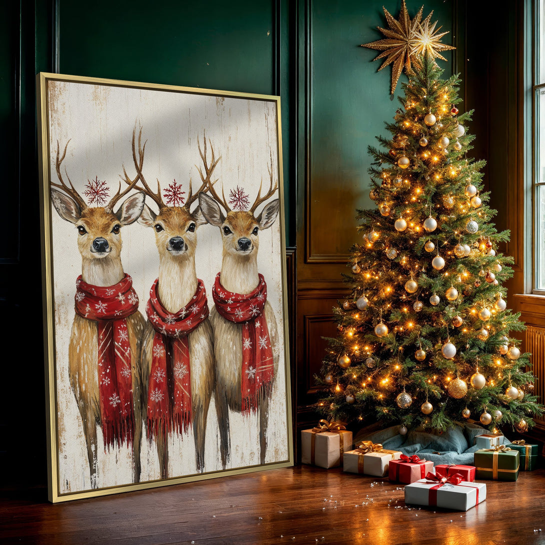 Canvas Print featuring three festive reindeer with red scarves, rustic style, warm earth tones and pops of red. Perfect Christmas wall art!