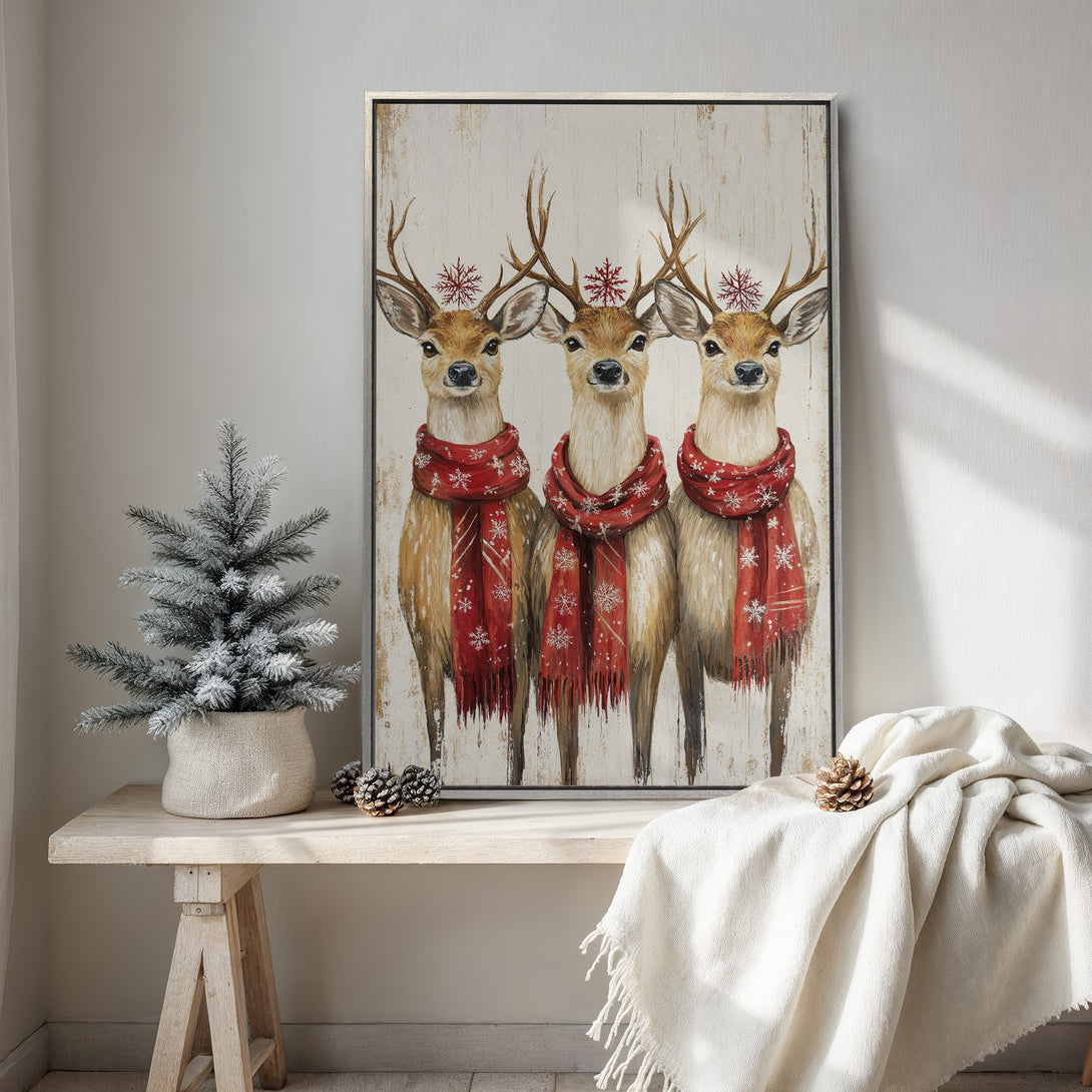 Framed Wall Art: Festive reindeer canvas print with red scarves. Rustic style, warm color palette. Perfect Christmas decor for your home!