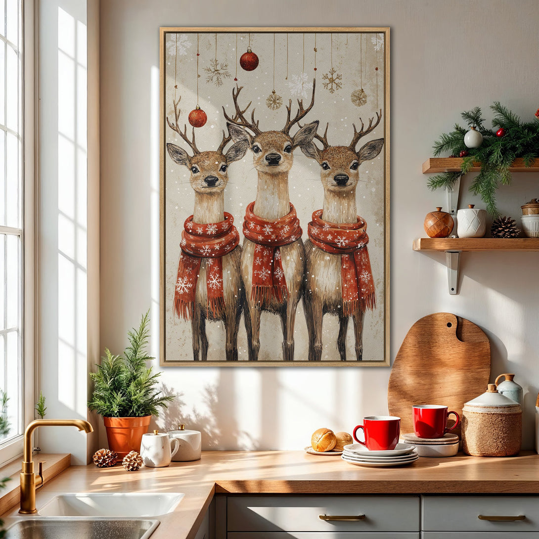 Framed Wall Art featuring three festive deer in red scarves. Warm, neutral color palette with wintery accents. Perfect Christmas decor for your home!