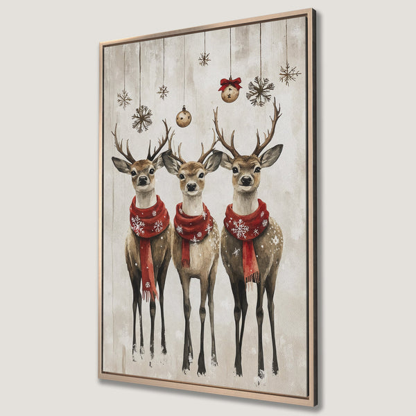 Framed Wall Art featuring three watercolor deer in red scarves. Neutral palette with festive snowflakes. Perfect holiday decor!