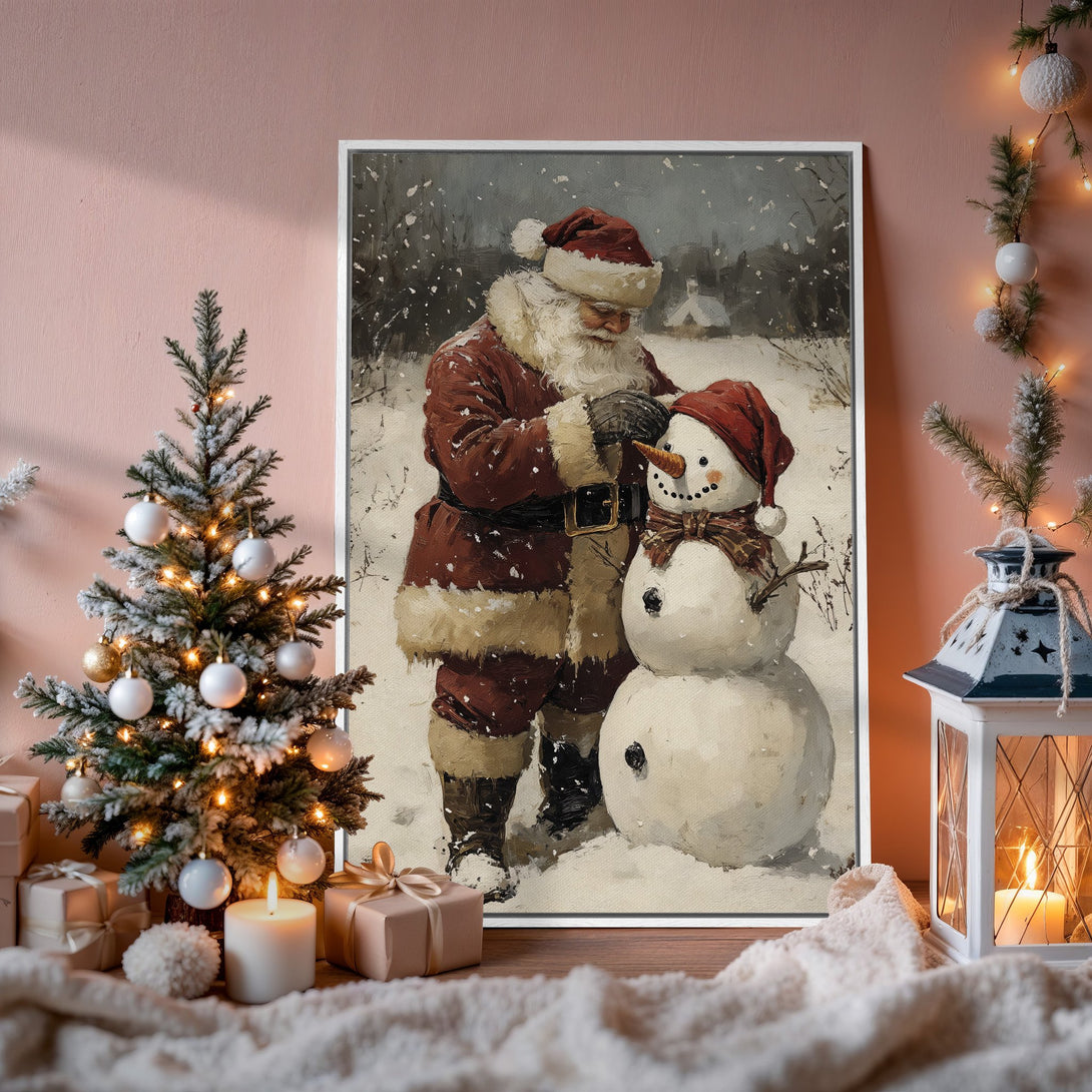Framed Wall Art: Santa Claus building a snowman in a winter scene. Rustic style, warm red and neutral color palette. Perfect Christmas decor.