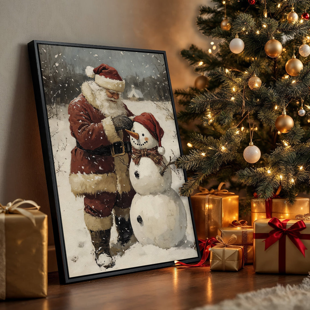 Framed Wall Art: Santa building a snowman in a snowy scene. Warm, festive color palette with reds, browns, and whites. Perfect Christmas decor.