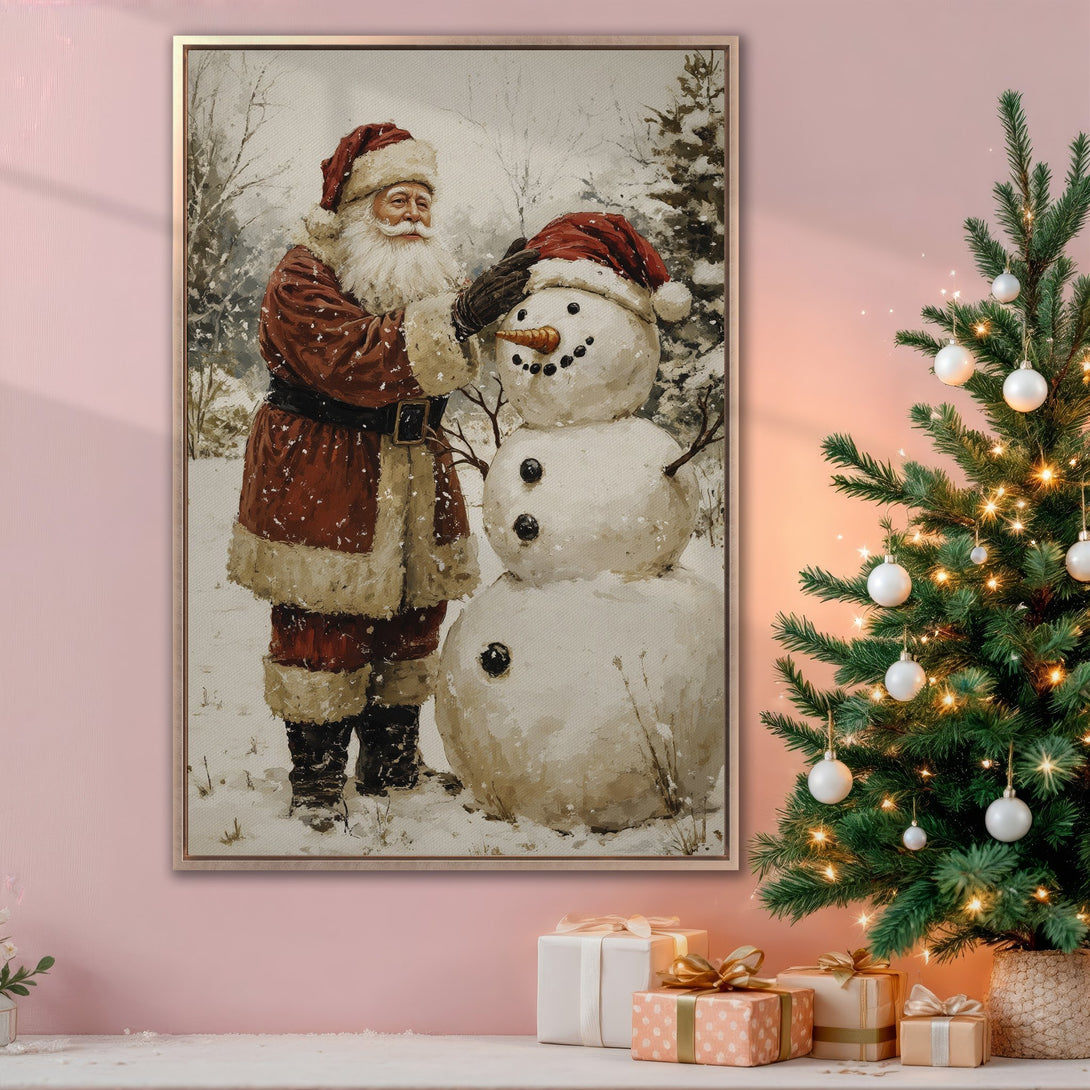 Framed Wall Art: Santa building a snowman in a vintage style, warm red and beige tones. Perfect Christmas decor!