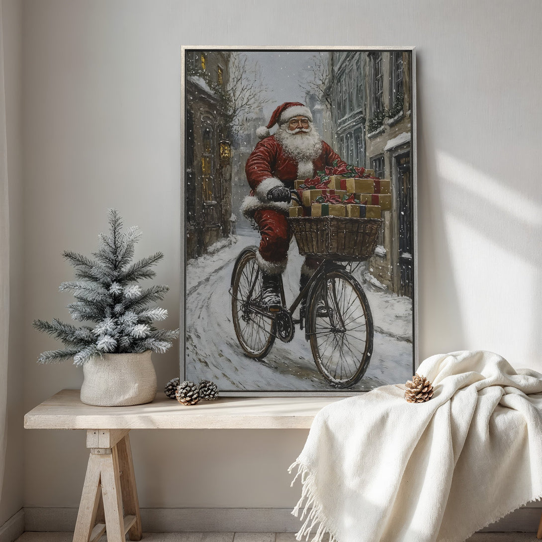 Framed Wall Art: Santa Claus on a bicycle in a snowy scene. Vintage style with a warm red and neutral color palette. Perfect Christmas decor!
