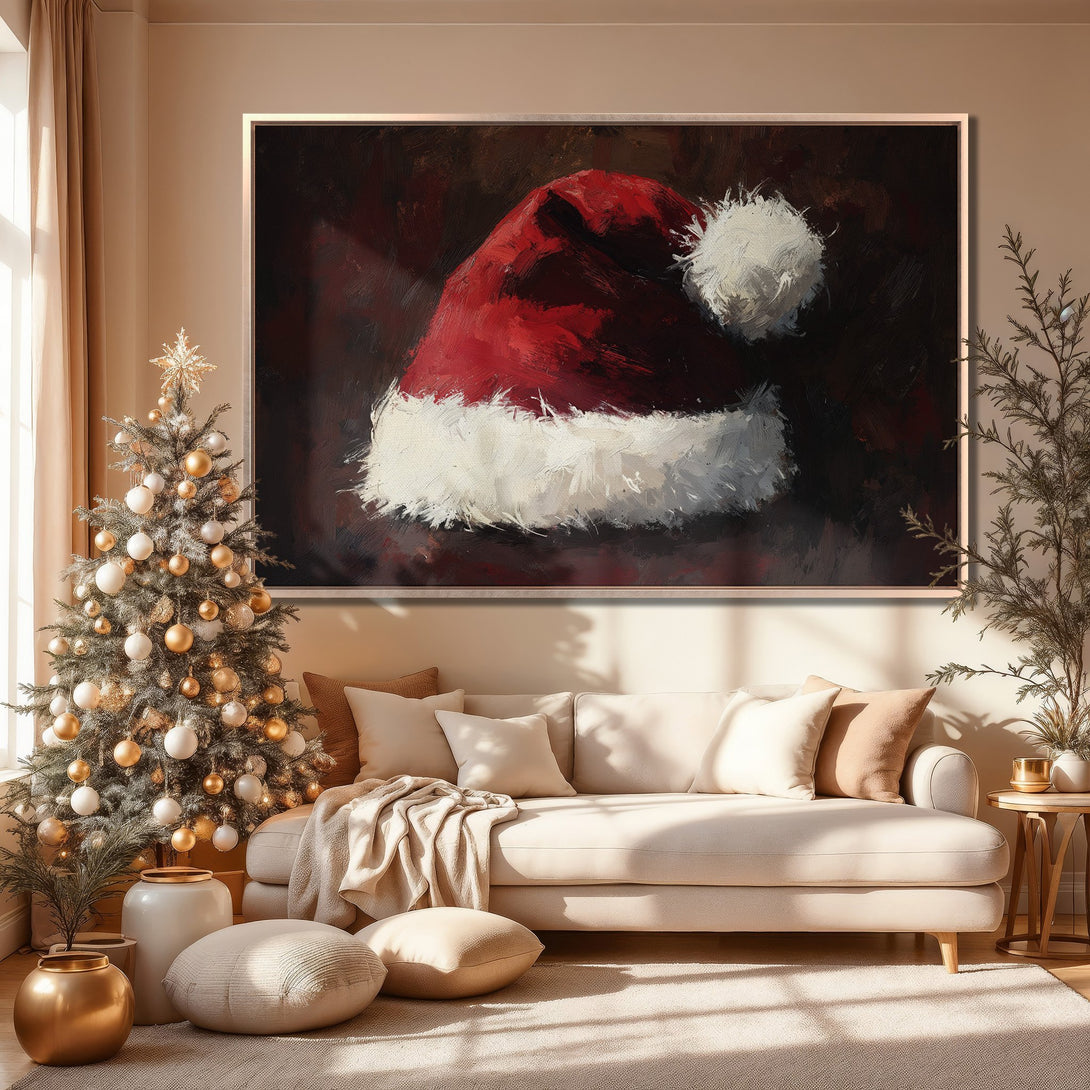 Framed Wall Art featuring a vibrant Santa hat painting in a warm, inviting living room. Rich red and white hues create a cozy Christmas vibe.