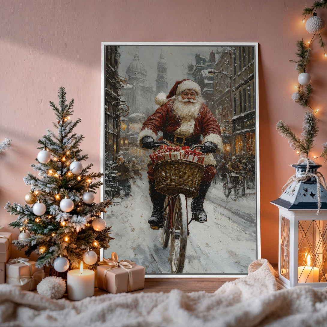 Framed Wall Art: Vintage Santa Claus on a bicycle in a snowy city scene. Classic style with warm red, white, and gray tones, perfect Christmas decor.