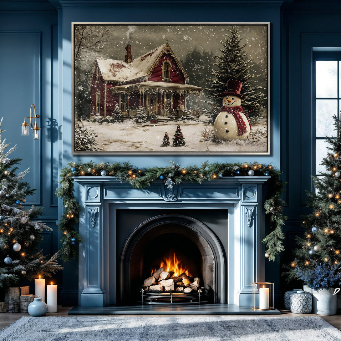 Winter scene Canvas Print featuring a snowy red house and snowman, displayed in a cozy blue interior. Warm, inviting holiday wall art.