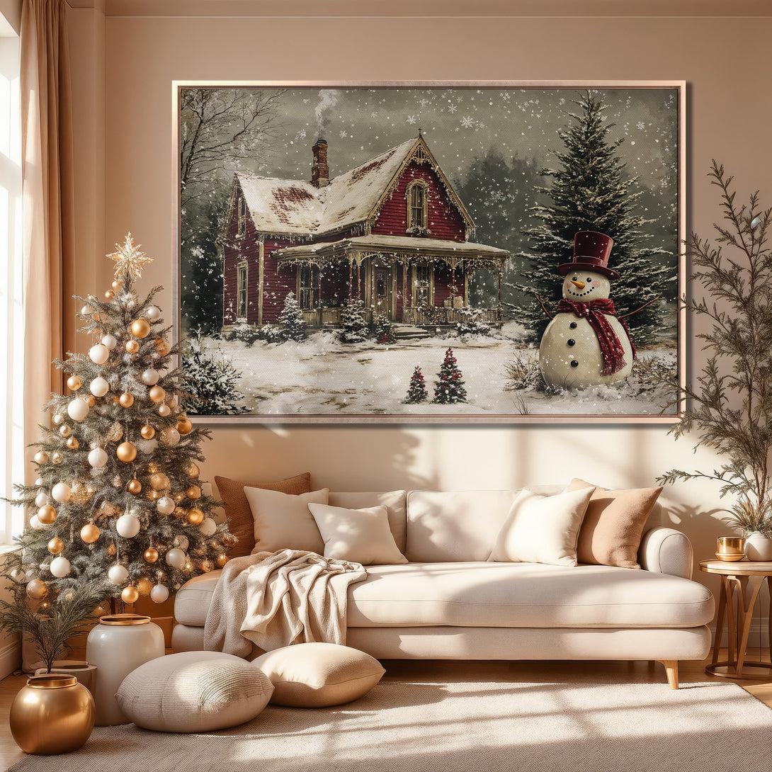 Framed Wall Art: Cozy winter scene with red house and snowman. Neutral color palette, perfect for holiday decor. Add warmth to your space!