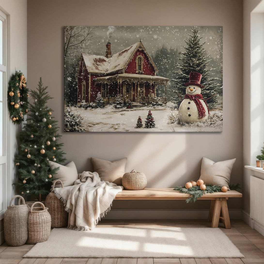 Framed Wall Art of a snowy winter scene with a red house and snowman. Warm, inviting colors perfect for holiday decor.