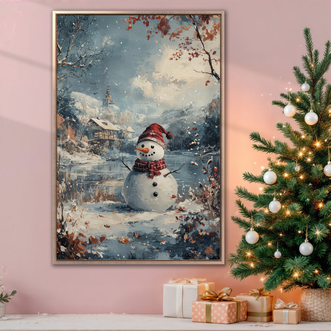 Framed Wall Art featuring a charming winter snowman scene. Rustic style with a blue, white, and red color palette. Perfect for holiday decor!