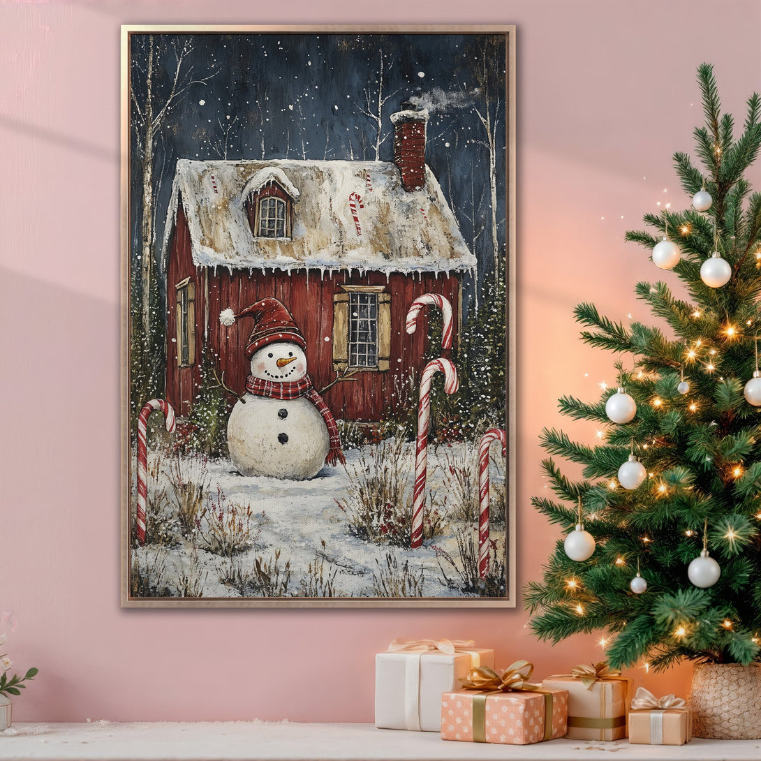 Framed Wall Art: Charming winter scene Canvas Print featuring a snowman, red house, and candy canes. Festive holiday decor in a warm, inviting color palette.