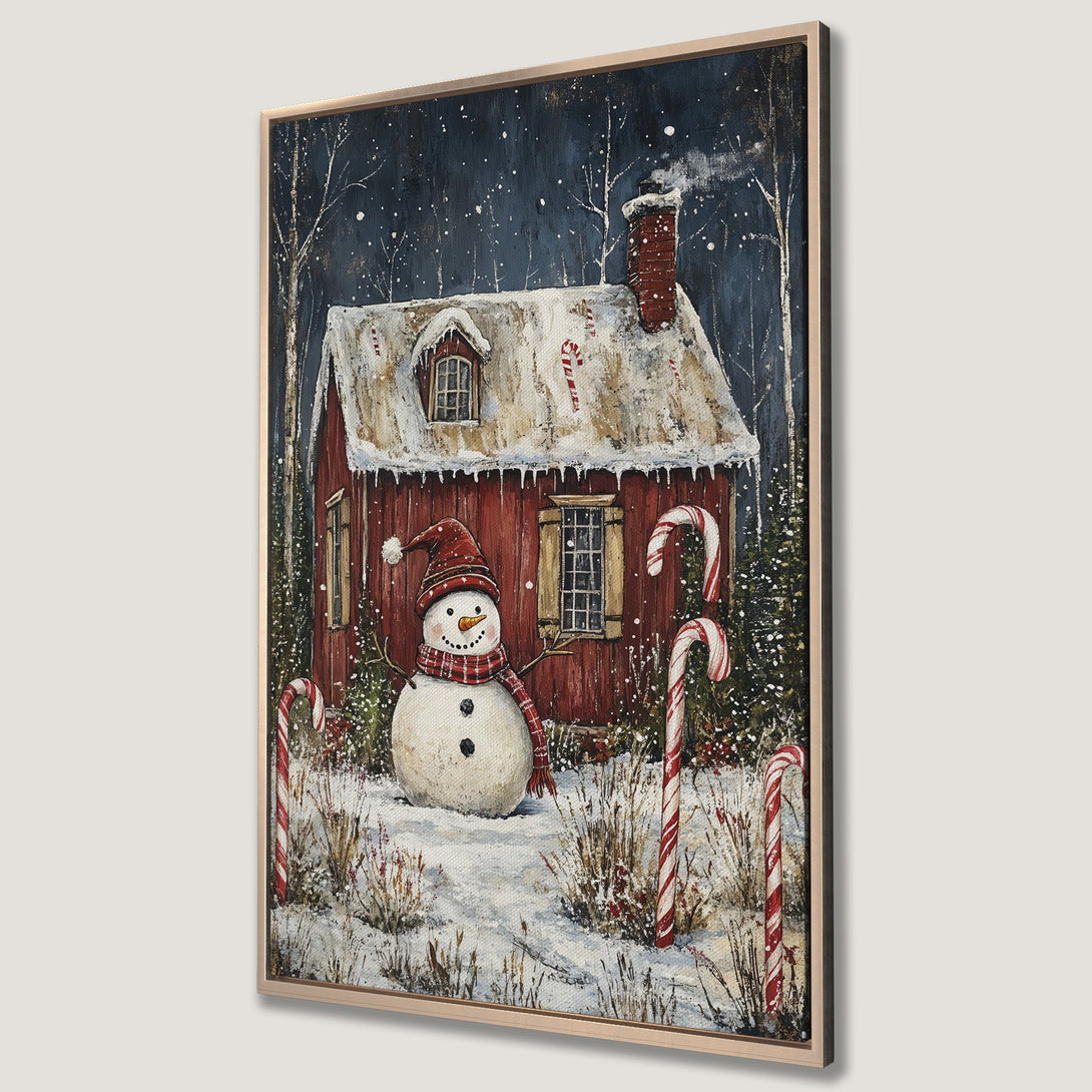 Framed Wall Art: Cozy winter scene with snowman & red cabin. Charming holiday decor in a rustic style with a blue, red, and white color palette. Perfect for Christmas!