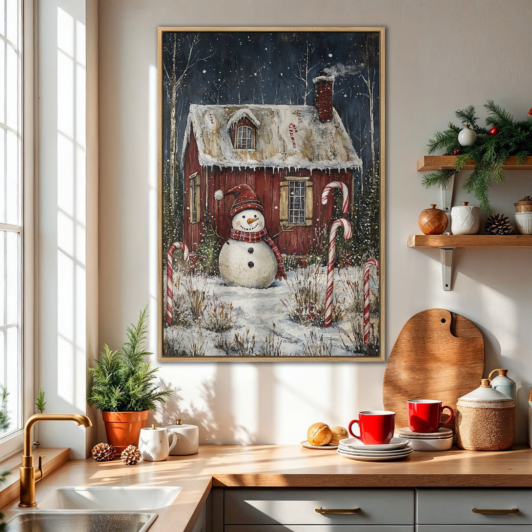 Framed Wall Art: Cozy winter scene Canvas Print with a red house, snowman, and candy canes. Warm, inviting color palette perfect for holiday decor.