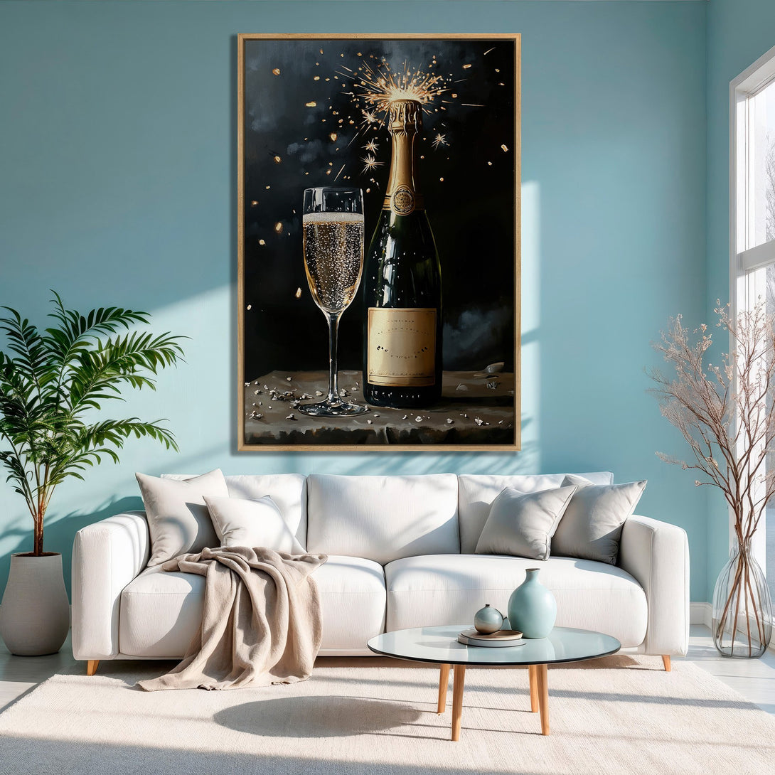 Framed Wall Art featuring a champagne bottle and glass, with a dark, celebratory style and gold/black color palette, displayed in a modern interior.