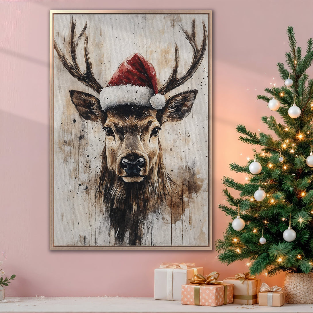 Framed Wall Art of a festive deer in a Santa hat, neutral watercolor style with brown and red tones, perfect for Christmas decor.