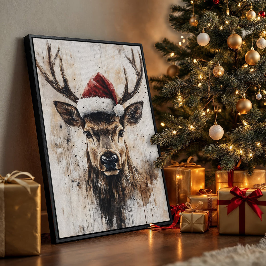 Framed Wall Art: Watercolor reindeer in Santa hat, warm neutral tones. Perfect Christmas decor! Shop our Canvas Print collection for holiday art.