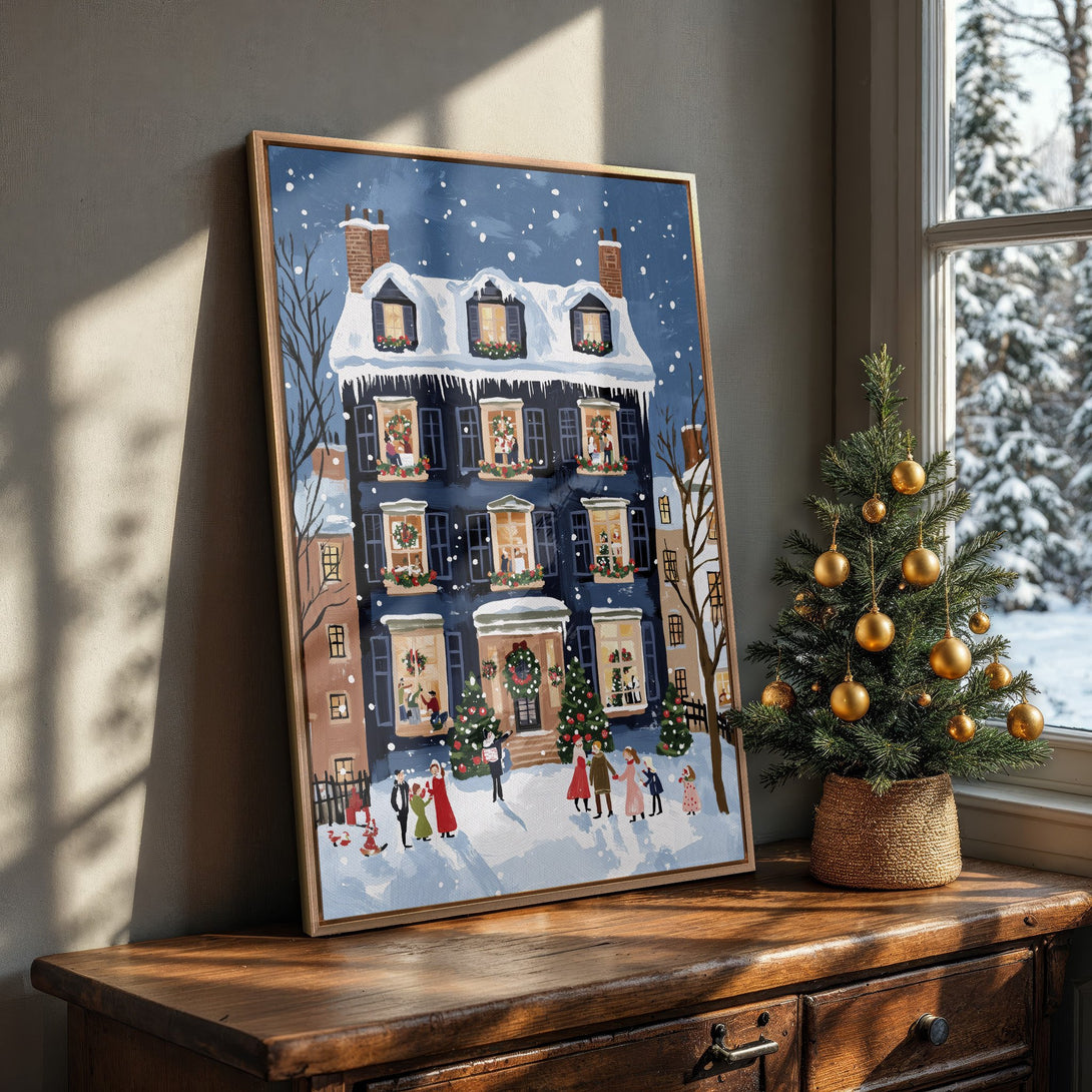 Framed Wall Art: Festive winter scene Canvas Print. Charming illustration of a snowy house with people. Blue, white, and warm tones. Bring holiday cheer to your home!