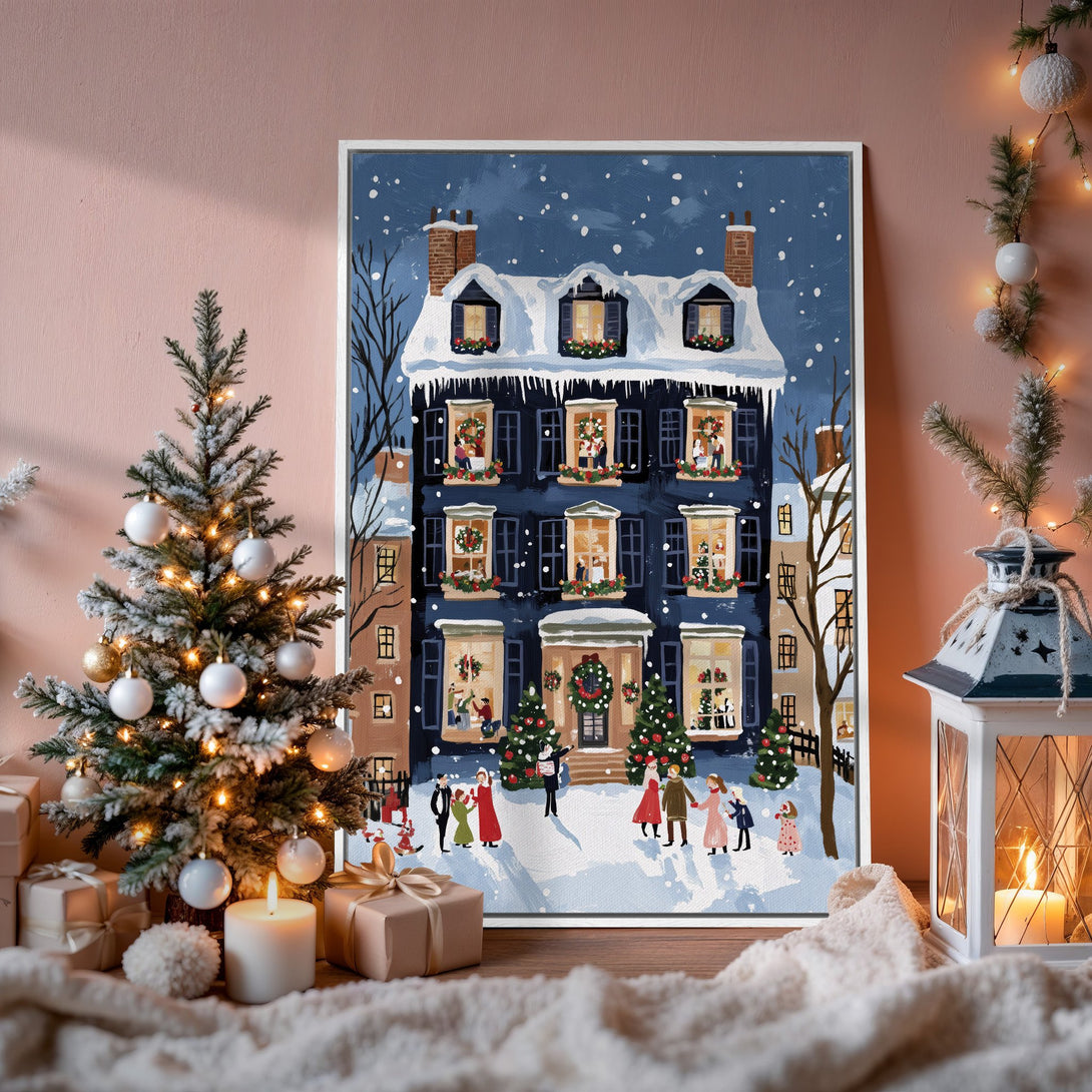 Framed Wall Art: Festive winter scene canvas print with a charming blue house, snowy details, and warm color palette for cozy holiday decor.