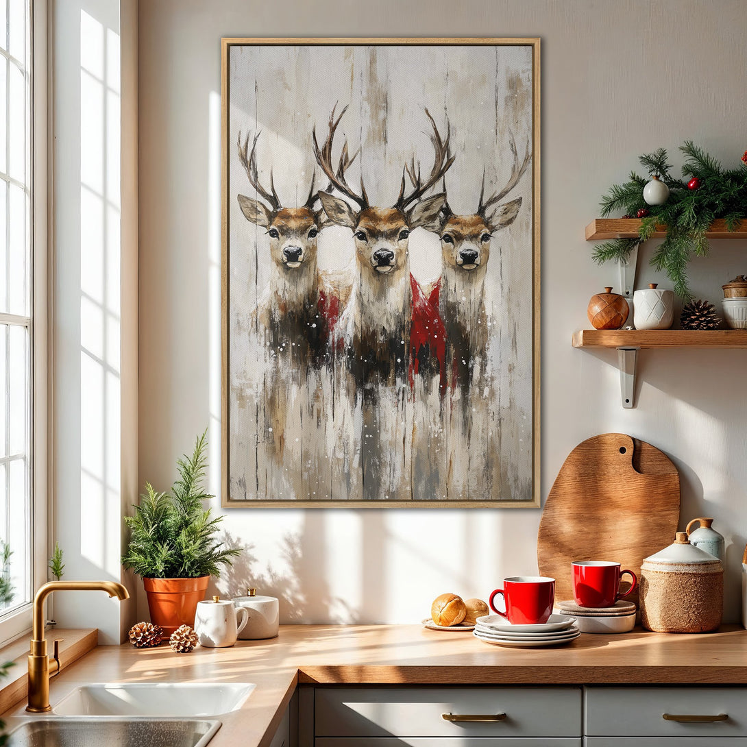 Framed Wall Art featuring three deer in a painterly style with neutral tones and pops of red, perfect for adding rustic charm to your home decor.