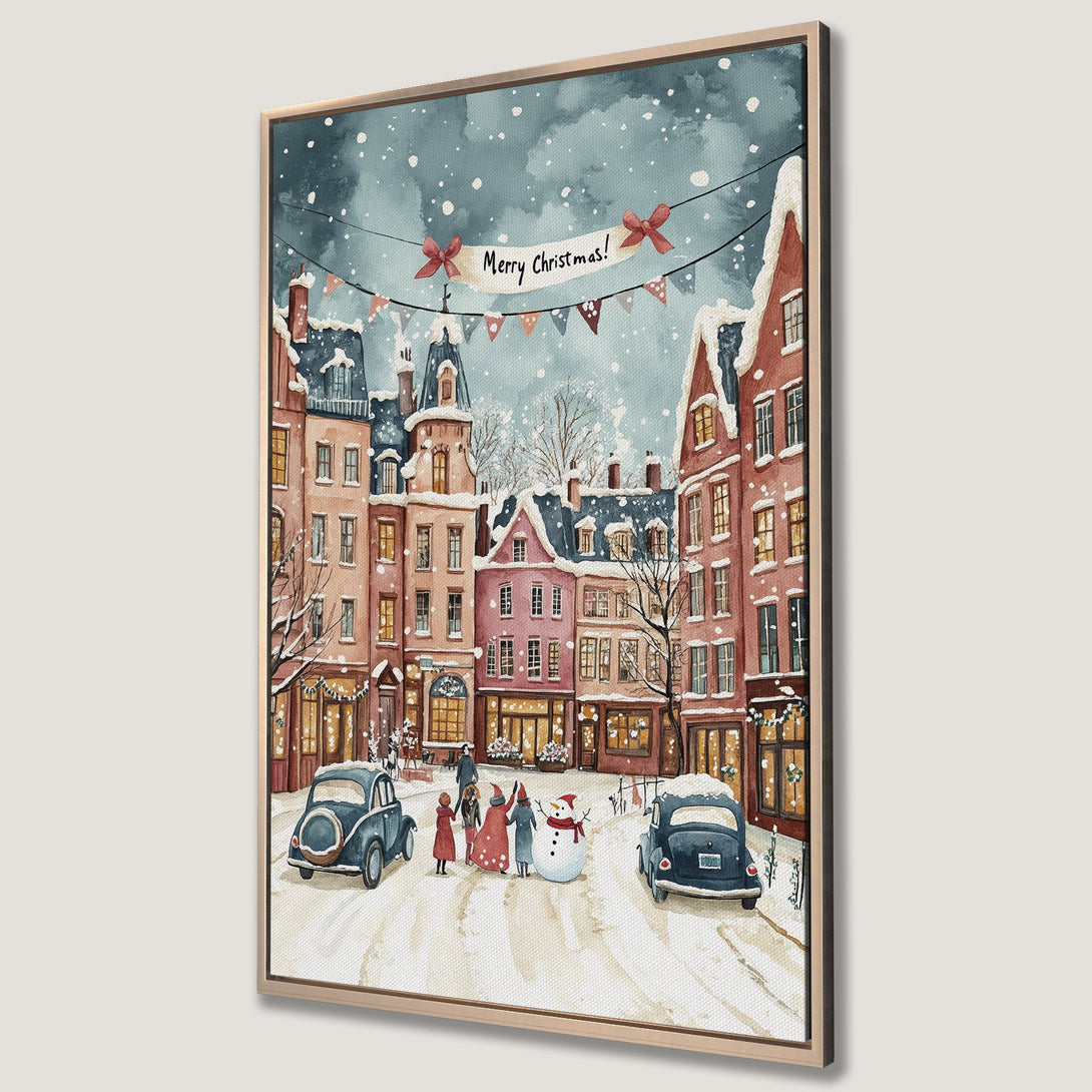 Framed Wall Art: Watercolor Christmas scene of snowy European village. Warm red and pink buildings, blue cars, and festive banner. Perfect holiday decor!