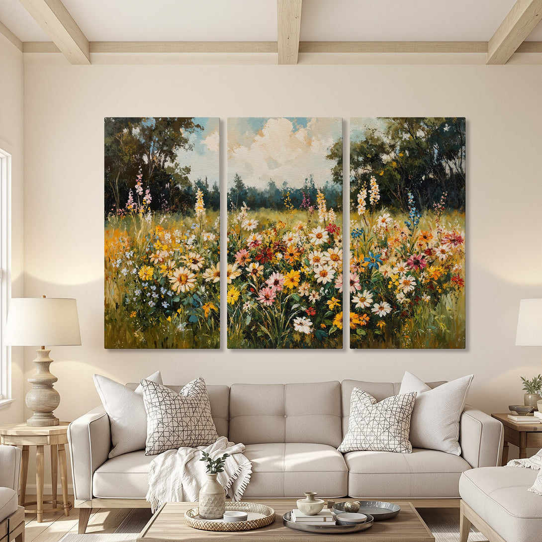 Canvas Print triptych of a vibrant wildflower meadow. Impressionistic style with a warm, colorful palette of yellows, pinks, and blues. Perfect wall art!
