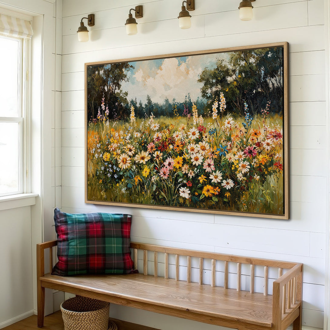 Framed Wall Art: Colorful wildflower meadow canvas print in a rustic interior. Featuring a vibrant palette of yellows, pinks, and blues.