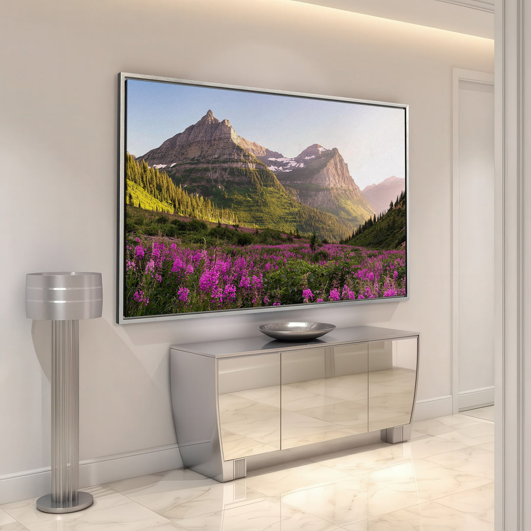 Framed Wall Art featuring a stunning mountain landscape with vibrant purple flowers. Earthy tones and a modern interior design. Bring nature indoors!