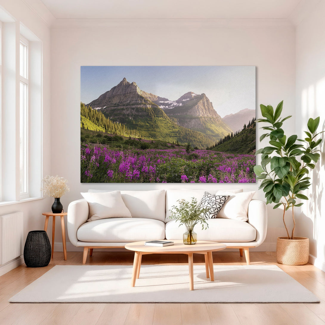 Framed Wall Art: Majestic mountain landscape Canvas Print with vibrant purple flowers, green trees, and a golden frame. Adds a touch of nature's beauty.