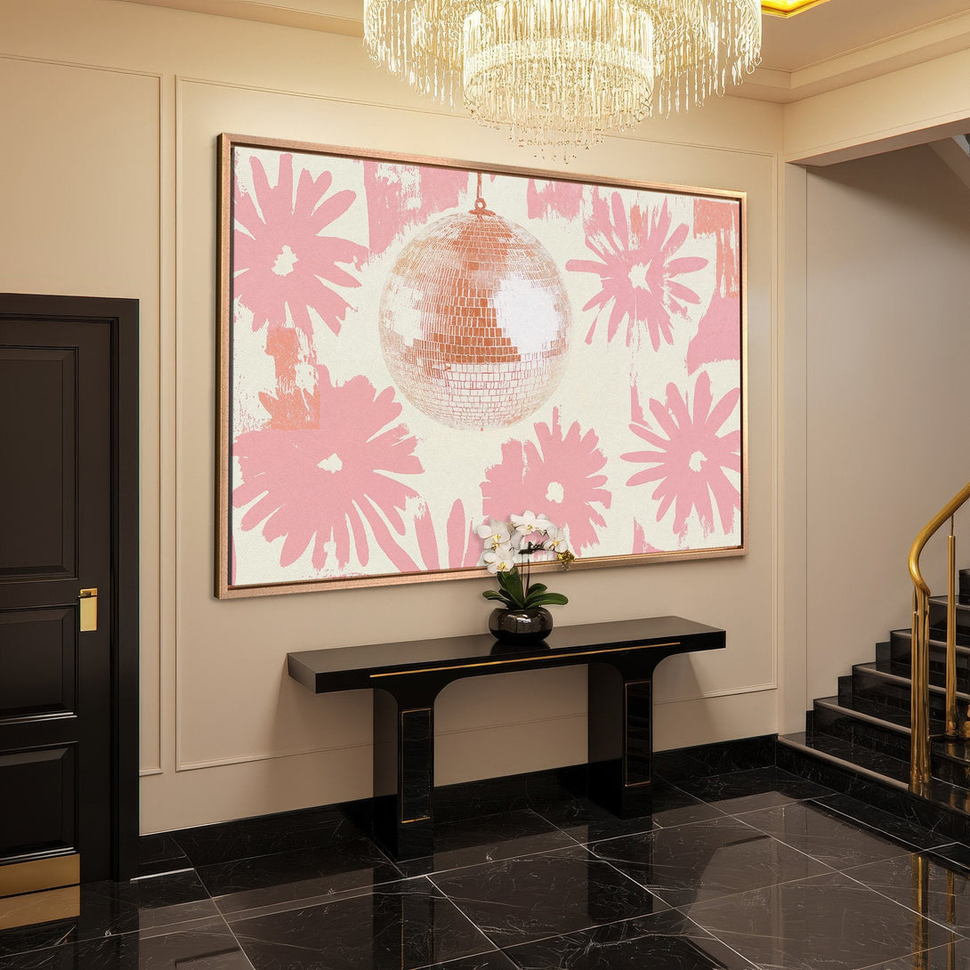 Framed Wall Art featuring a pink disco ball and floral design. Modern, stylish canvas print in a blush and cream color palette. Perfect for home decor.