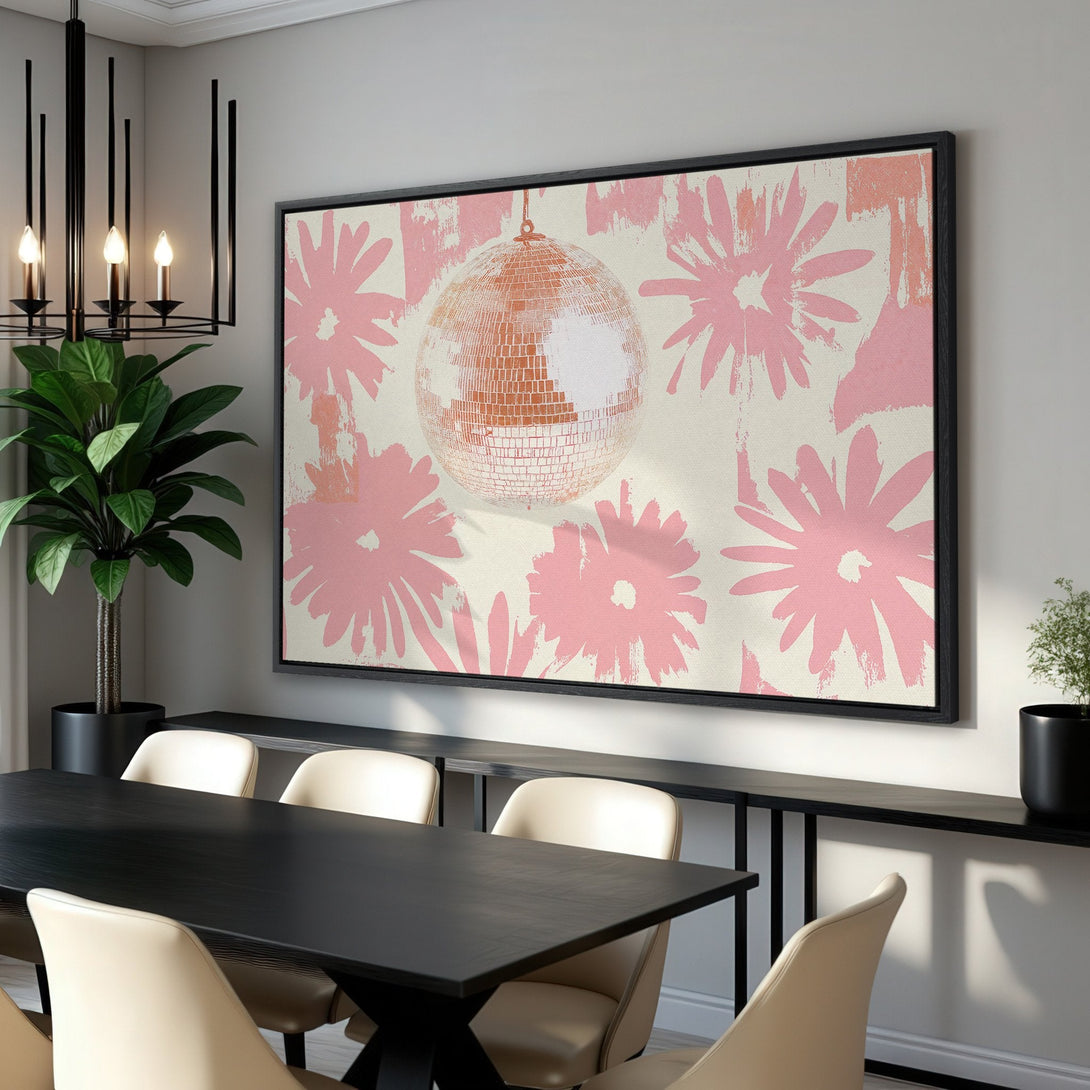 Framed Wall Art featuring a disco ball and floral design in pink and beige, adding a pop of retro style to any space.