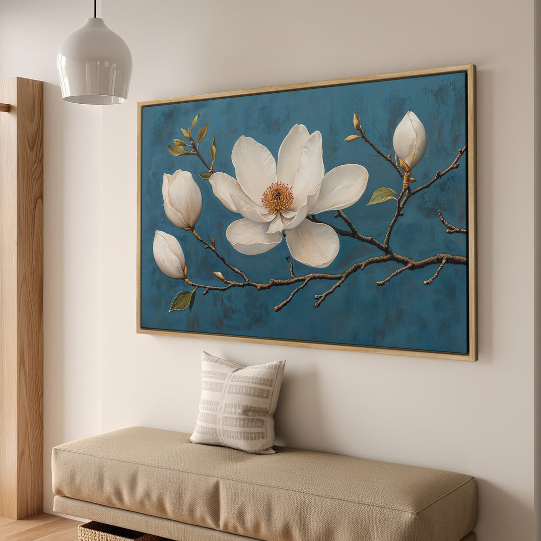 Framed Wall Art: Elegant white magnolia flower canvas print with teal background. Adds a touch of nature and sophistication to any space.