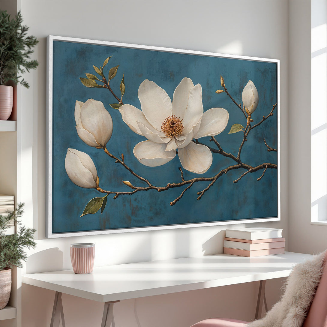 Framed Wall Art featuring a stunning white magnolia on a teal background. Elegant floral art with a calming, neutral color palette. Perfect for any space!