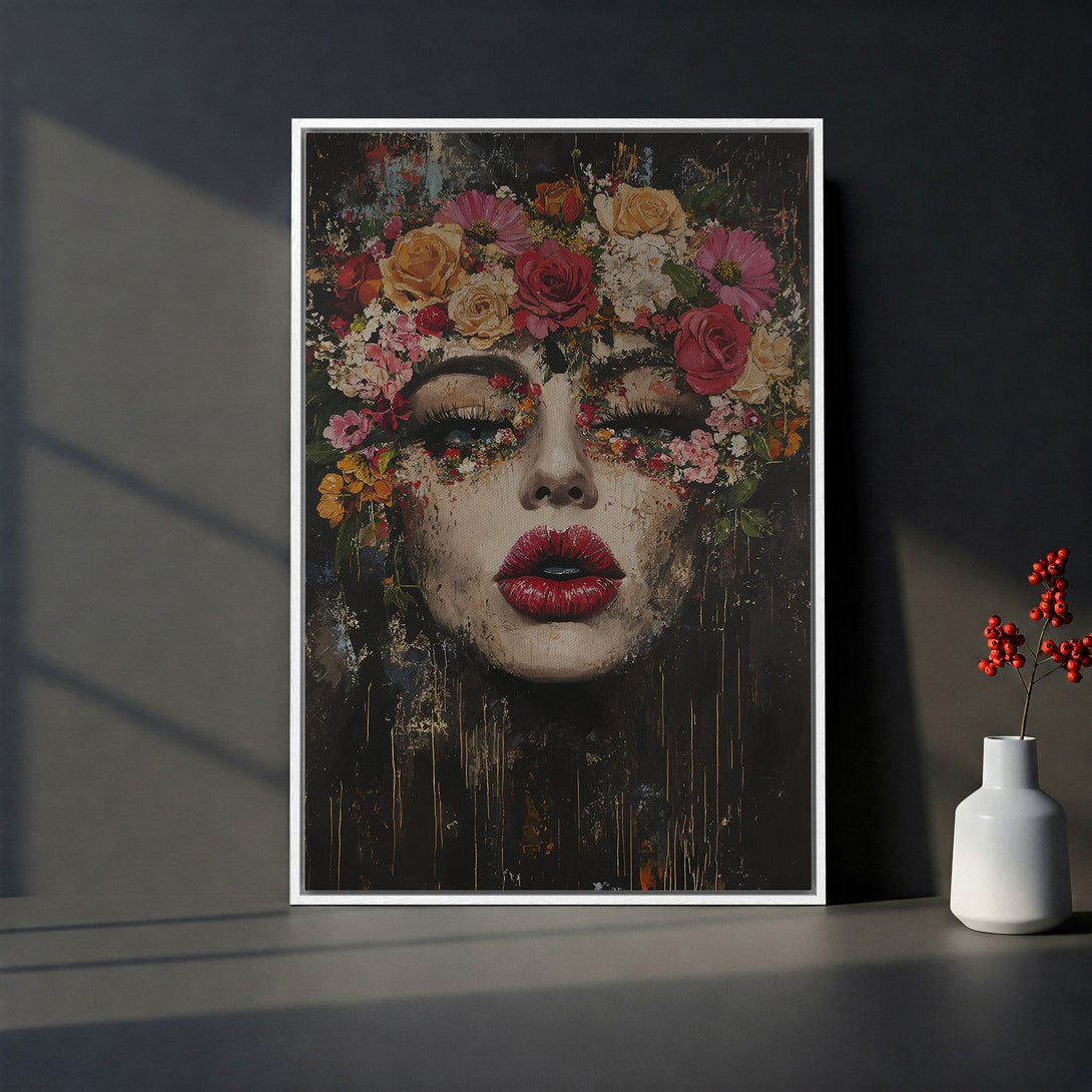 Framed Wall Art featuring a woman with floral crown, rich reds, pinks, and yellows, in a dark, artistic style. Perfect for home decor.