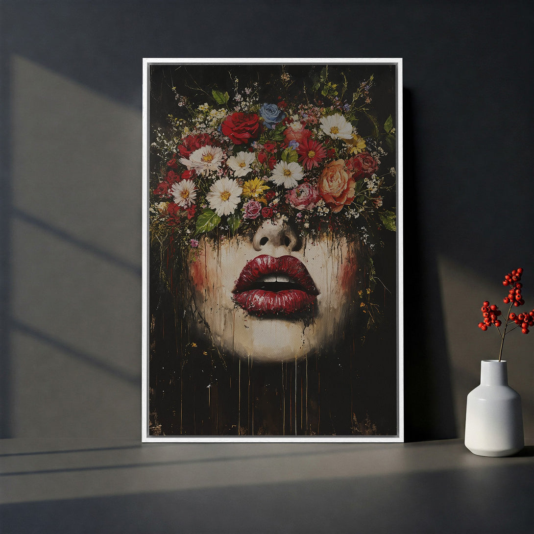 Framed Wall Art: Floral face portrait with vibrant red lips & colorful flowers. Dark, moody palette. Elevate your space with this stunning canvas print.