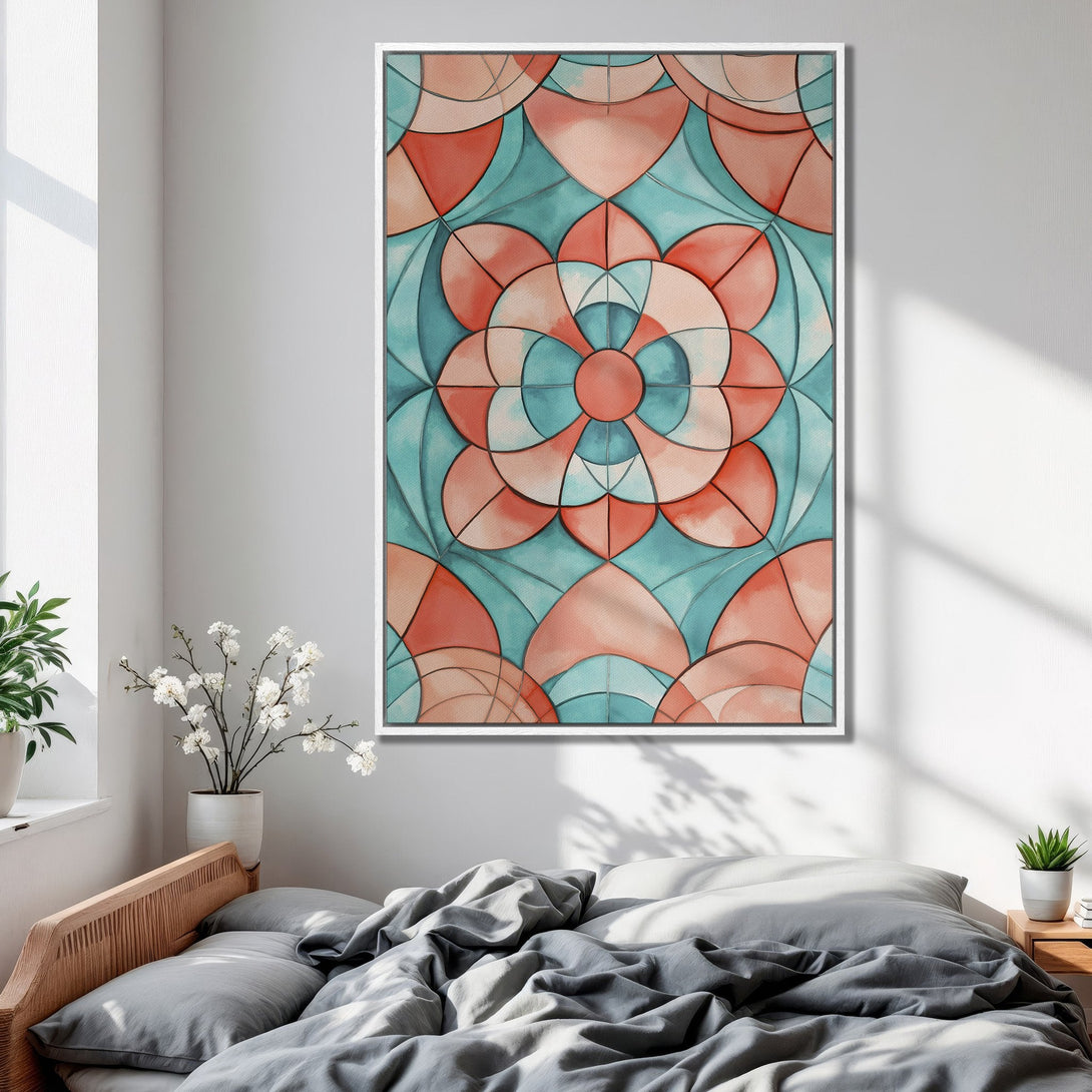 Framed Wall Art featuring a floral geometric design in coral and teal. Modern art print adds a pop of color to any bedroom.