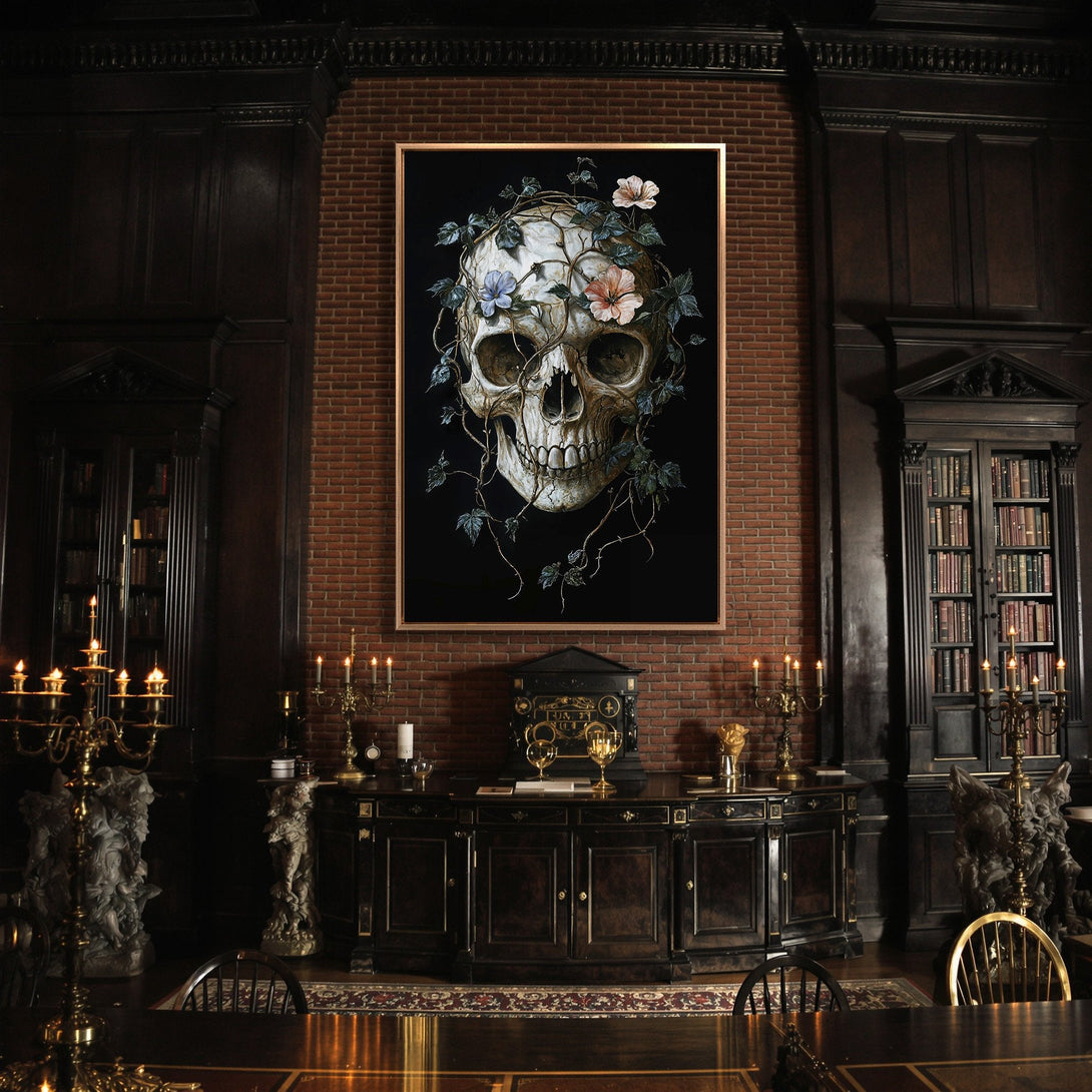 Framed Wall Art: Gothic skull with flowers on black background. Dark, moody interior with brick wall and rich, warm color palette. Perfect for a statement piece.