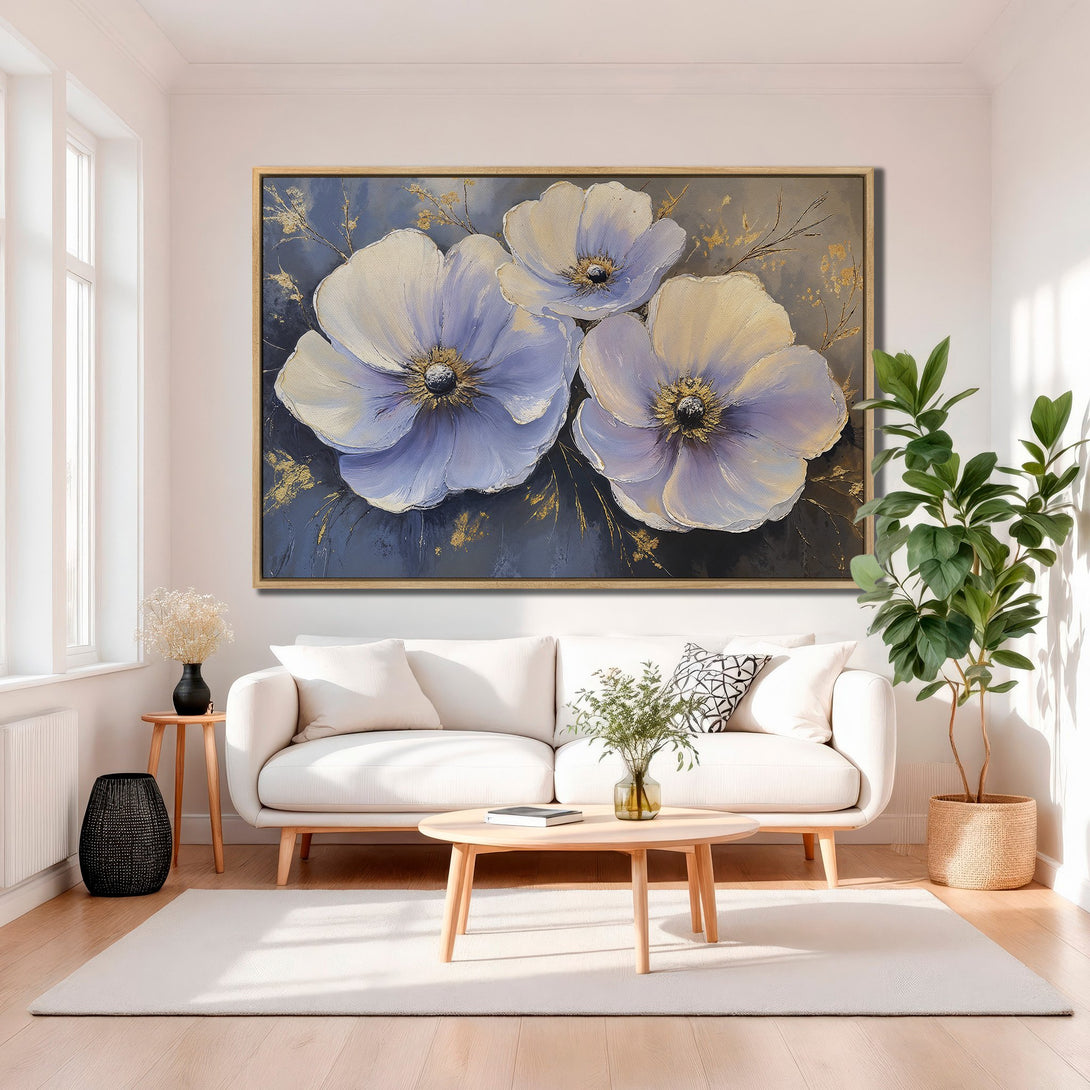 Framed Wall Art: Large floral canvas print in a modern living room. Features a soft blue and gold color palette, adding elegance to any space. Shop now!