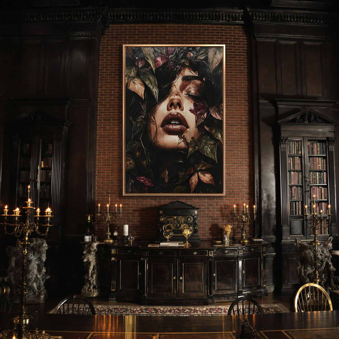 Framed Wall Art featuring a woman's face, surrounded by leaves. Moody, dark color palette with rich reds and greens. Perfect for a dramatic interior.