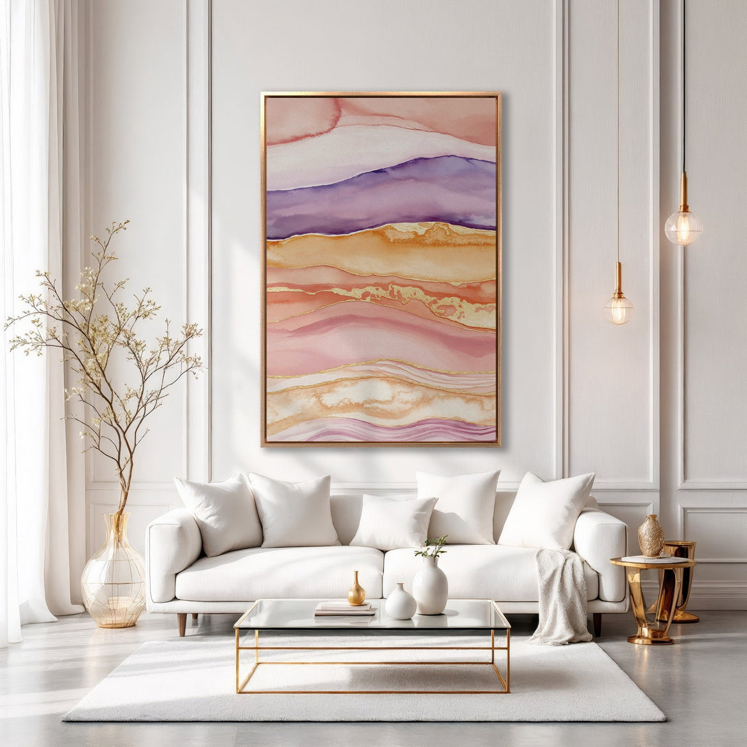 Framed Wall Art featuring an abstract landscape in warm pink, purple, and gold tones. Modern art for home decor.