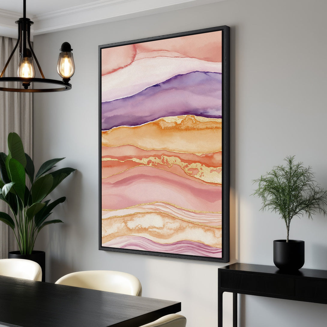 Framed Wall Art featuring an abstract watercolor design in pink, purple, and gold tones. Perfect for adding a touch of elegance to any interior. Shop now!