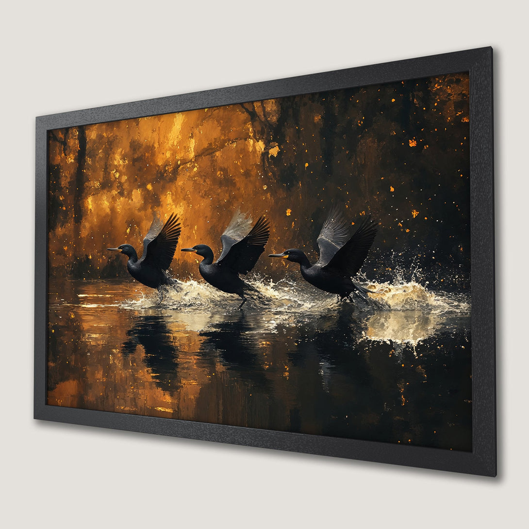 Framed Poster of black birds taking flight over water, impressionistic style, warm gold and black color palette. Add this art to your home!