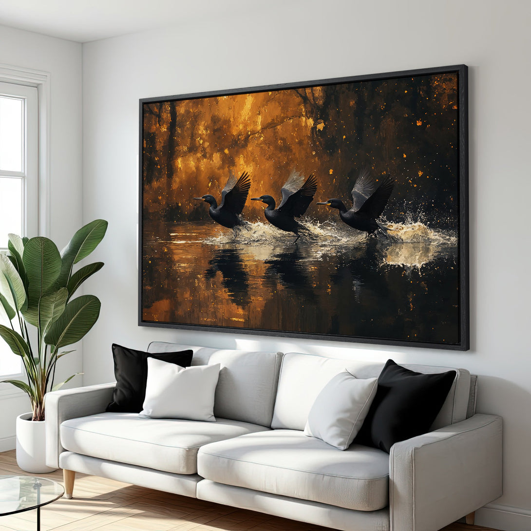 Framed Wall Art: Dramatic painting of birds taking flight with a warm, golden color palette. Perfect for adding a touch of nature to your home.