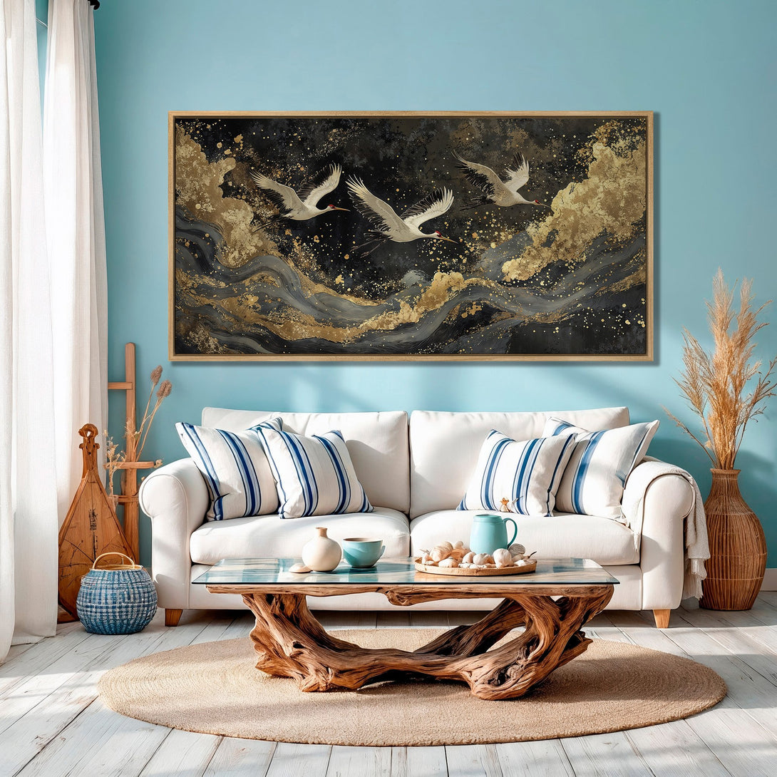 Framed Wall Art featuring elegant cranes in flight, with a black, gold, and grey abstract design. Perfect for modern home decor.