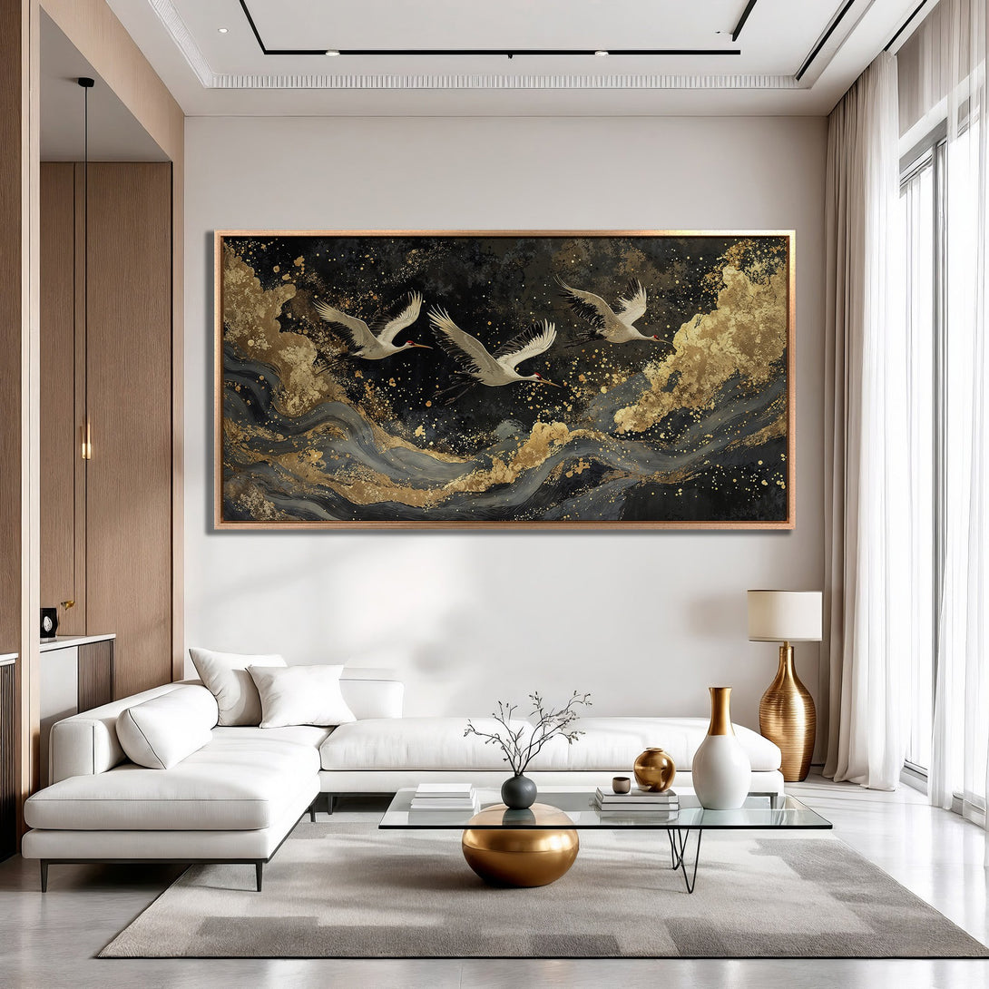 Framed Wall Art of cranes in flight, modern style, featuring a black, gold, and gray color palette. Elevate your space with this stunning artwork.