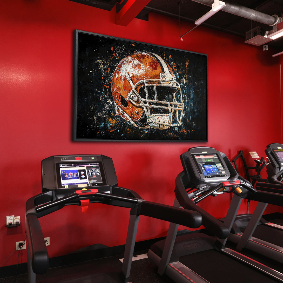 Framed Wall Art: Abstract football helmet art in orange and blue hues. Adds a bold statement to any space. Perfect for sports fans!