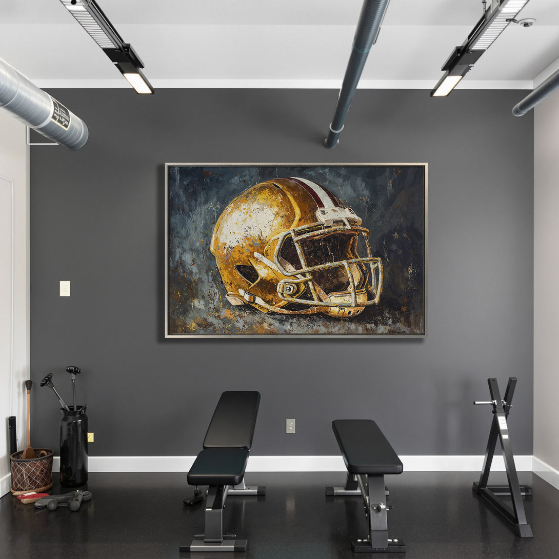 Framed Wall Art featuring a golden football helmet, displayed in a modern gym. Abstract style with a dark, moody color palette. Elevate your space!