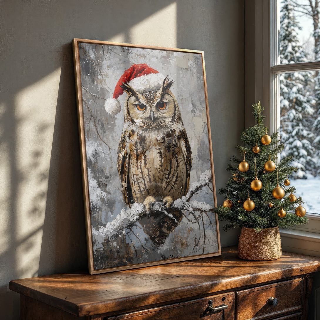 Framed Wall Art: Festive owl painting in a winter scene, featuring a warm, neutral color palette. Perfect holiday decor for your home!