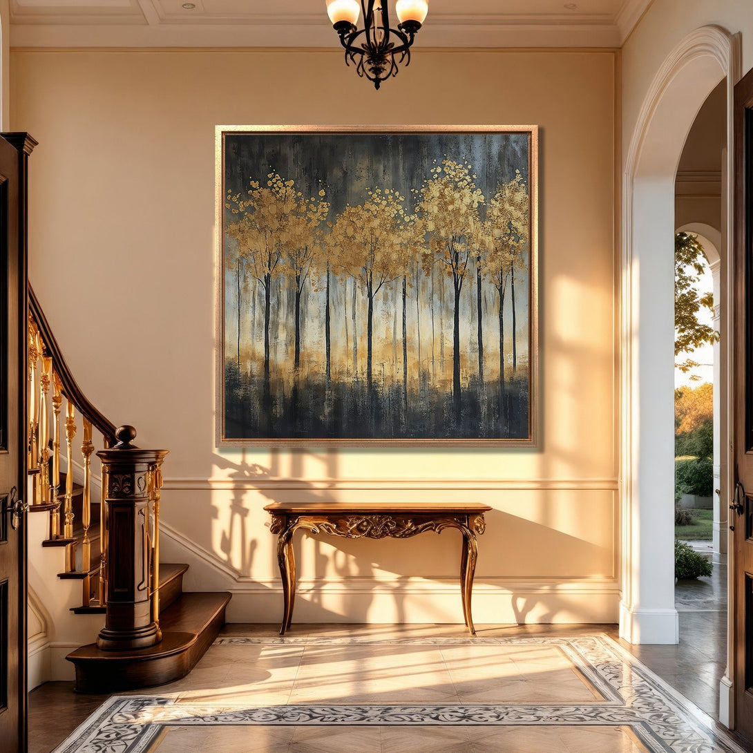 Framed Wall Art featuring gold leaf trees in an entryway. Abstract art in a neutral color palette, perfect for adding elegance to your home decor.