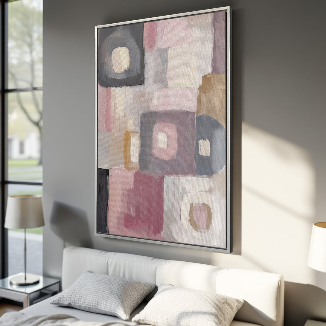 Framed Wall Art: Abstract art canvas print in a modern bedroom. Features a soft, muted color palette of pinks, grays, and beige. Perfect for contemporary decor.