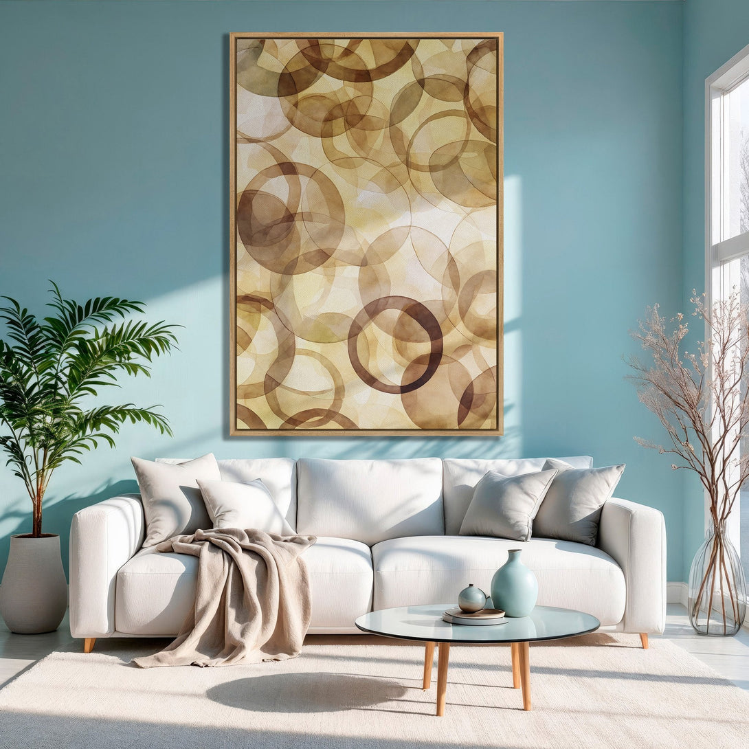 Framed Wall Art featuring abstract watercolor circles in warm brown tones. Modern art canvas print adds a stylish touch to any living room decor.
